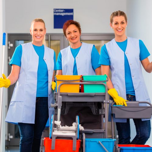 Cleaning service at work, tree women in teamwork